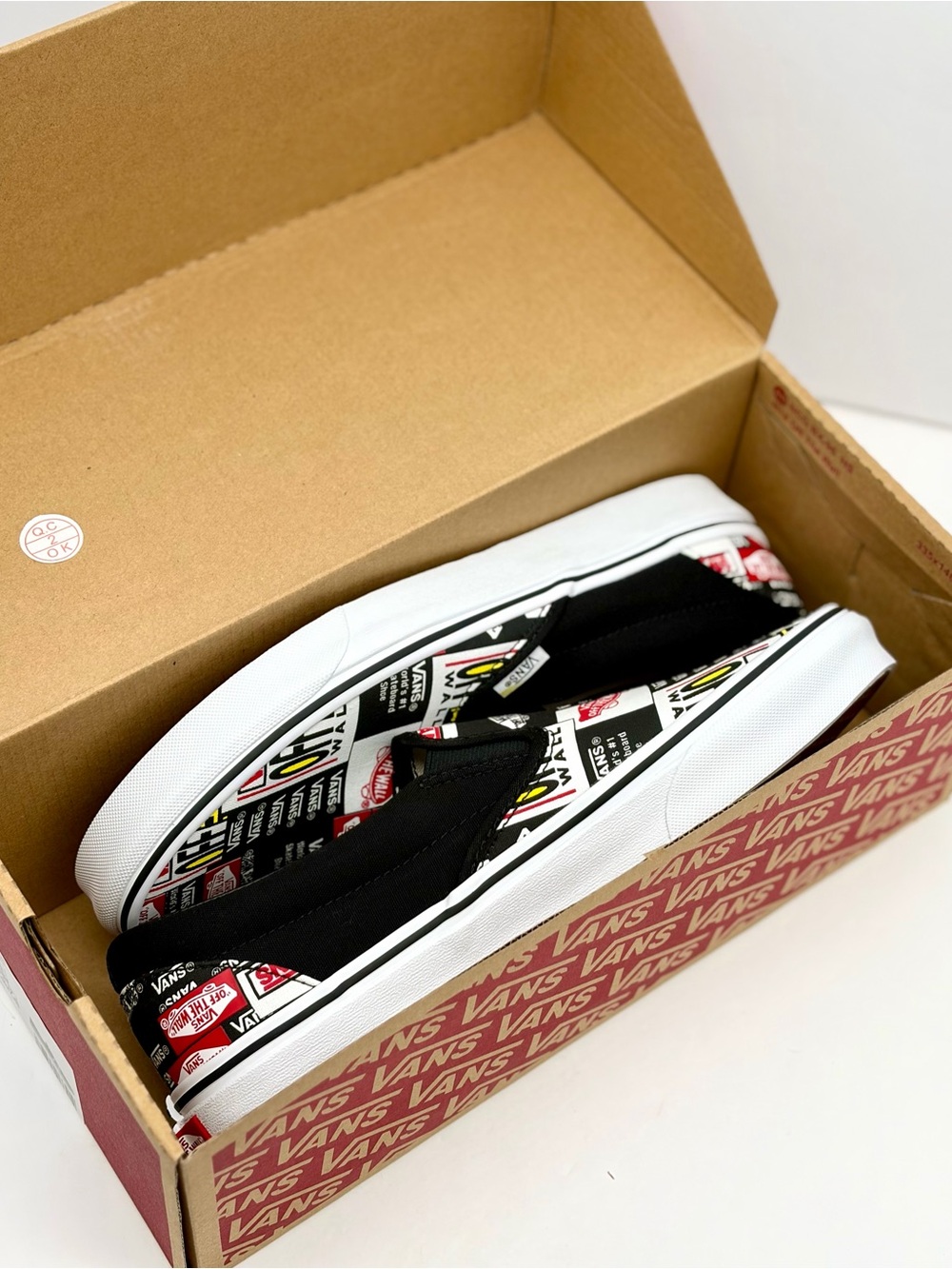 Vans Slip-On Sneakers in Black White and Red Sticker Print Unisex - Picture 8 of 10